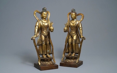 A pair of large Chinese gilt bronze figures,...