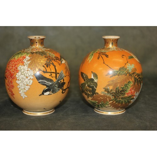 A pair of small bulbous satsuma ware vases, decorated birds ...