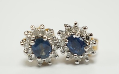 A pair of yellow metal, sapphire and diamond set oval cluste...