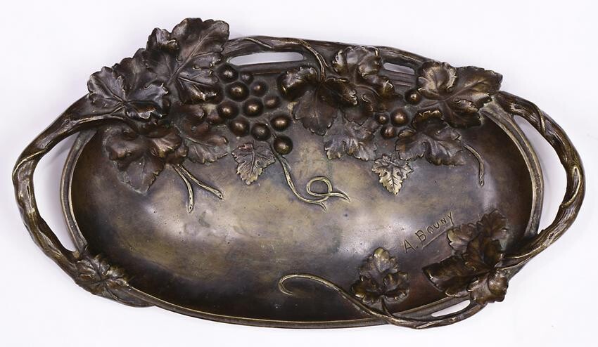 A patinated bronze oval tray in the Art Nouveau taste