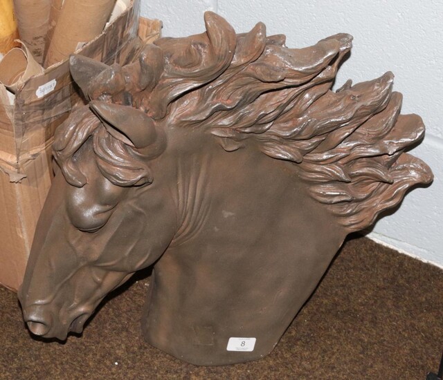 A reproduction horses head with flowing mane