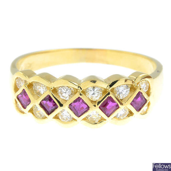 A ruby and diamond band ring.