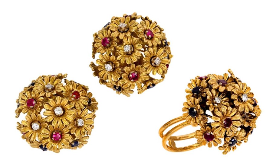 A ruby sapphire and diamond demi-parure, comprising a pair of earclips and a ring, each designed as a cluster of articulated flower heads, centring on brilliant-cut diamonds, and circular-cut rubies and sapphires respectively, clip and post...