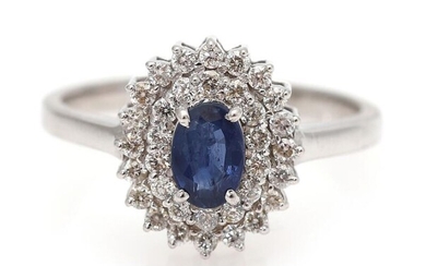 NOT SOLD. A sapphire ring set with a sapphire encircled by numerous diamonds, mounted in 14k white gold. Size 52. – Bruun Rasmussen Auctioneers of Fine Art