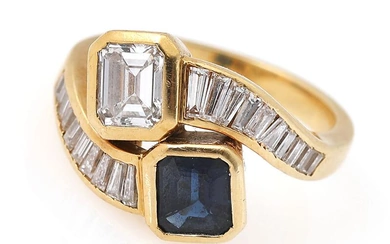 A sapphire ring set with an emerald-cut sapphire weighing app. 0.80 ct....