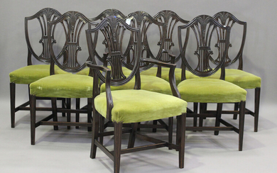 A set of eight early 20th century George III style mahogany dining chairs, comprising two carvers an