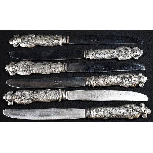 A set of six Chinese silver coloured metal table knives, eac...