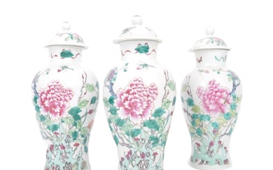 A set of three Chinese Yongzheng marked famille rose lidded ...