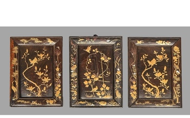 A set of three Japanese lacquered wood panels, Meiji period,...