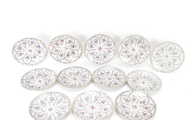 A set of twelve Chinese Qing dynasty famille rose plates, 18...