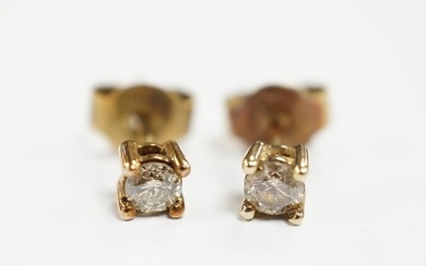 A small pair of 375 and solitaire diamond set ear studs, gro...