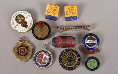 A small selection of cyclist badges