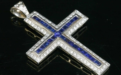 A white gold sapphire and diamond Latin-style cross