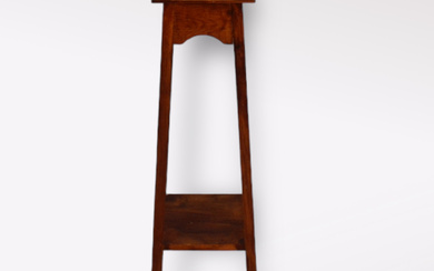 A wooden pedestal, 20th century.