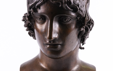 AFTER THE ANTIQUE: A BRONZE BUST OF A YOUTH, PROBABLY NARCISSUS