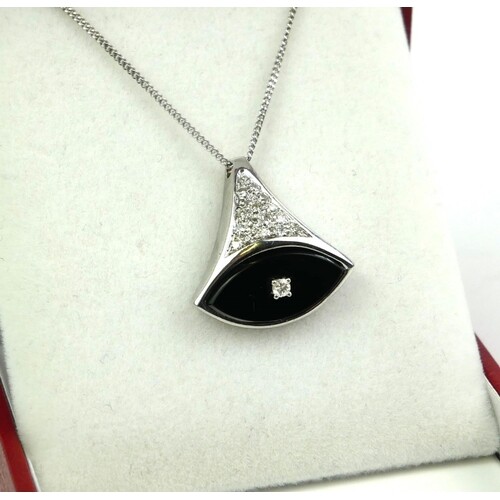 AN 18CT WHITE GOLD, DIAMOND AND BLACK ONYX PENDANT NECKLACE ...