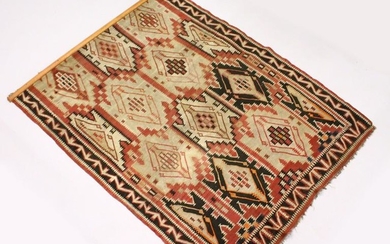 AN AFGHAN KELIM CARPET, of typical form. 7ft 5ins x