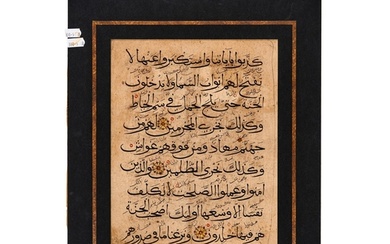 AN ILKHANID QURAN FOLIO, IRAN 14TH CENTURY Arabic manuscri...