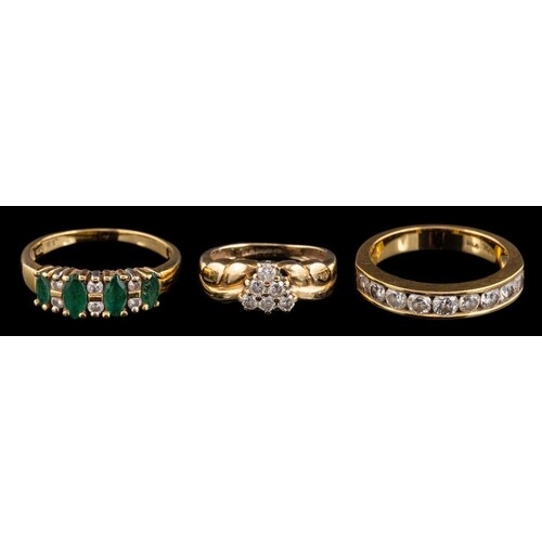An 18 carat gold diamond half eternity ring,: set with nine ...