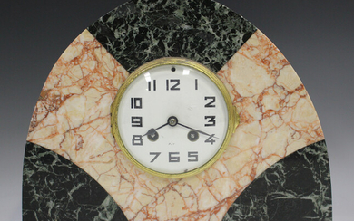 An Art Deco French marble cased mantel clock with eight day movement striking on a bell via an outsi