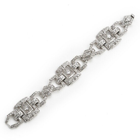 An Art Deco diamond bracelet set with numerous old, single and brilliant-cut diamonds weighing a total of app. 6.00 ct., mounted in platinum. Circa 1930.
