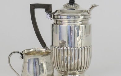 An Edward VII Silver Hot Water Jug, by the...