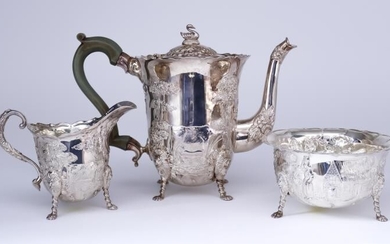 An Elizabeth II Irish Silver Cylindrical Three Piece Tea...