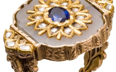 An Indian sapphire and diamond-set gold ring with revolving jade disc, 20th century