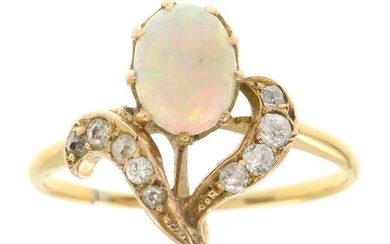 An early 20th century gold opal and diamond ring.
