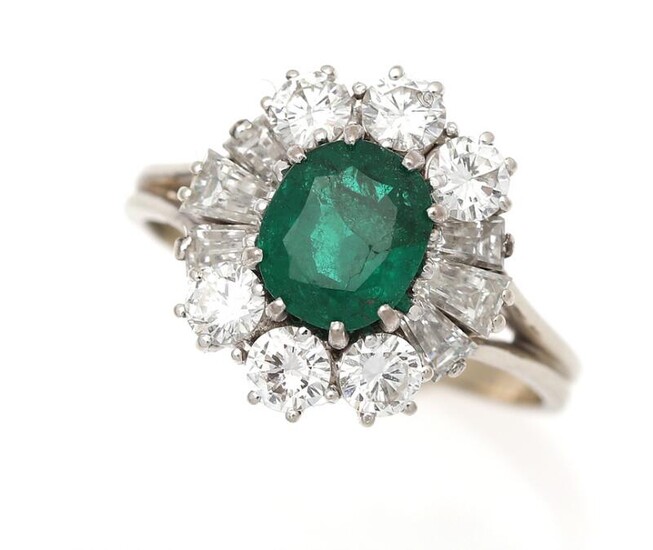 NOT SOLD. An emerald and diamond ring set with an emerald weighing app. 1.25 ct. encircled by numerous diamonds, mounted in 18k white gold. Size 56. – Bruun Rasmussen Auctioneers of Fine Art