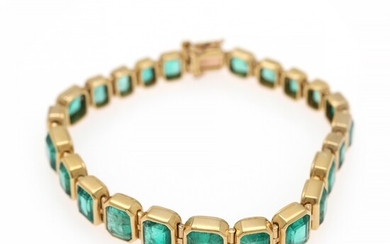 An emerald bracelet set with numerous emerald-cut emeralds weighing a total of app. 18.0 ct., mounted in 18k gold. L. 17.5 cm.