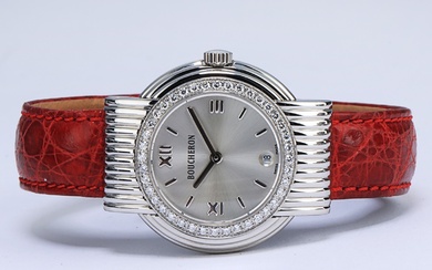 Boucheron 'Reflet Solis'. Ladies' watch in steel with diamond-studded bezel, 2000s