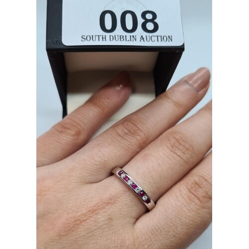 Brand new 9ct white gold diamond and ruby eternity ring, siz...