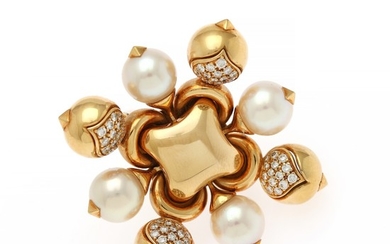 Bulgari: A pearl and diamond brooch “Pigne” set with cultured pearls and numerous brilliant-cut diamonds, mounted in 18k gold. App. 4.5×4.5 cm. Original case.