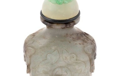 CHINESE CARVED MOTTLED AGATE SNUFF BOTTLE 19th Century Height 2.5". Celadon stopper with floral