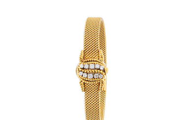 Cartier. A fine lady's 18K gold manual wind bracelet watch...