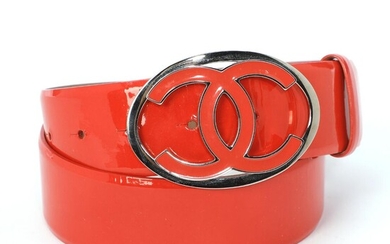 Chanel A belt of red patent leather with red and silver toned...