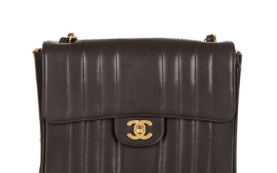 Chanel, a vintage vertical Classic Flap handbag, crafted fro...