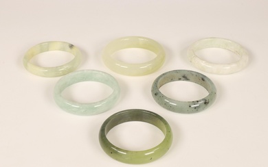 China, six various jade, jadeite and stone bracelets, modern