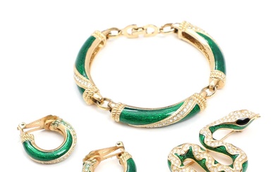 Christian Dior A jewellery set of gilt metal decorated with green enamel...