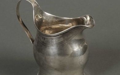 Cream Jug. A George III silver cream jug