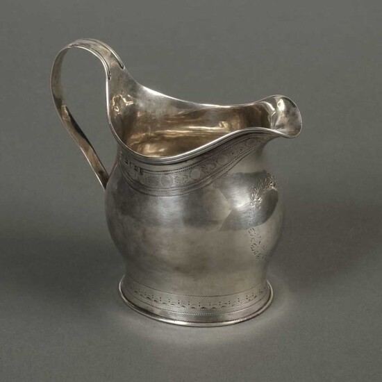 Cream Jug. A George III silver cream jug
