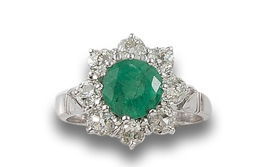DIAMOND AND EMERALD FLOWER RING, IN WHITE GOLD