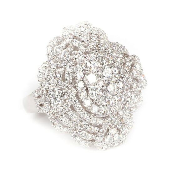 Diamond 18K white gold openwork pave cluster ring.