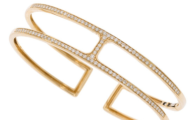 Diamond, Gold Bracelet The hinged cuff features full-cut diamonds...