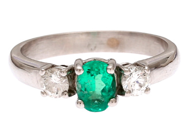 Diamonds and emerald triplet ring.