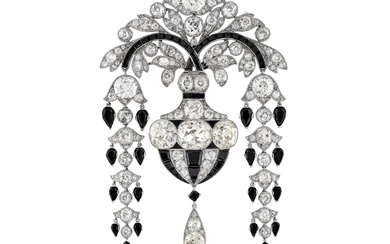 EXCEPTIONAL CARTIER ART DECO DIAMOND AND ONYX BROOCH