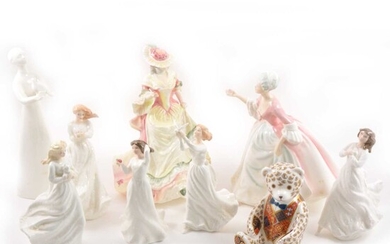 Eight Royal Doulton figurines, plus a Royal Crown Derby paperweight bear.