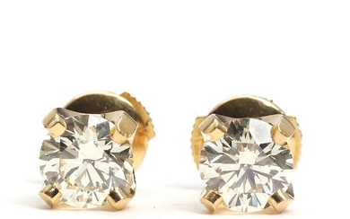 F. Hingelberg A pair of diamond earrings each set with brilliant-cut diamonds...