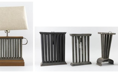 FIVE ASSORTED TIN CANDLE MOLDS One mounted as a table lamp. Heights including lampshade from 10" to 27".